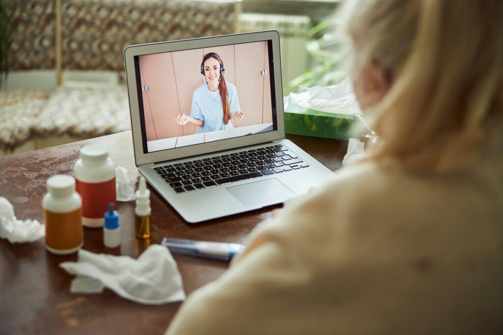 A patient talking to doctor on a virtual call